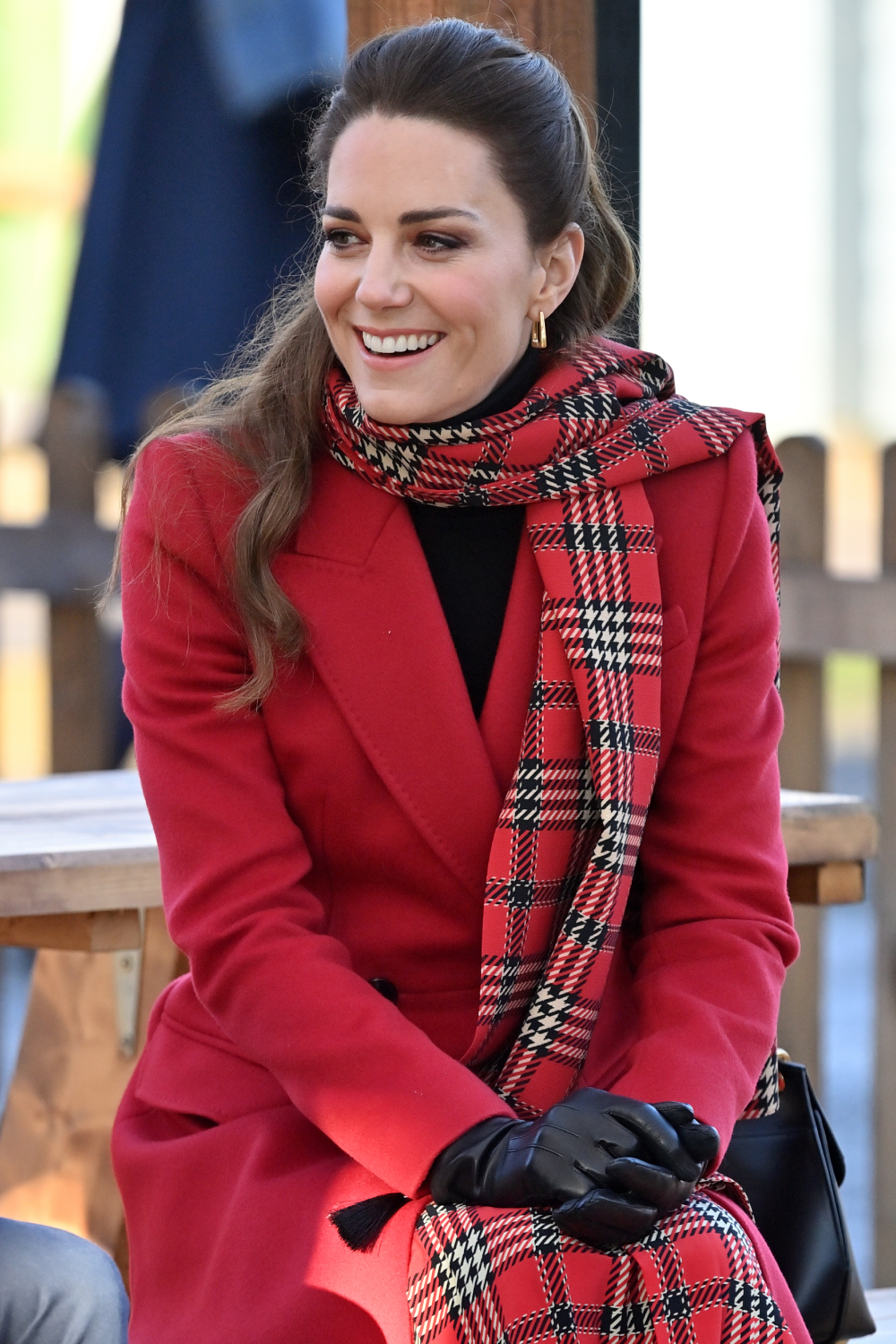 Kate Middleton sitting at an event