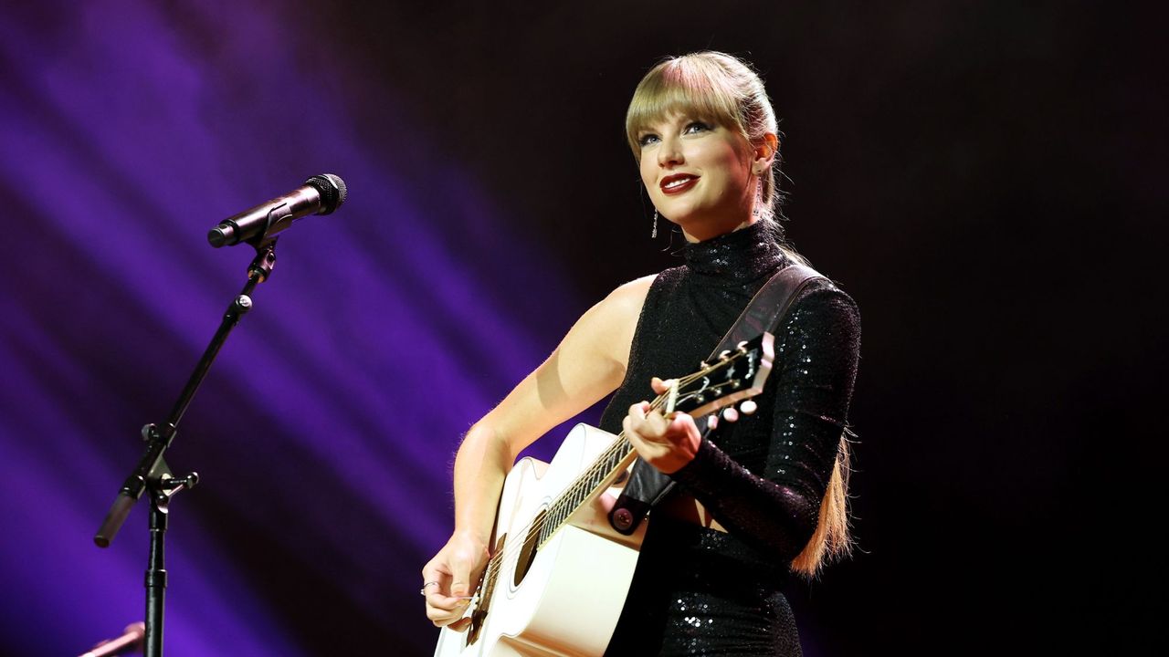 Taylor Swift performs onstage at the NSAI 2022 Nashville Songwriter Awards in 2022