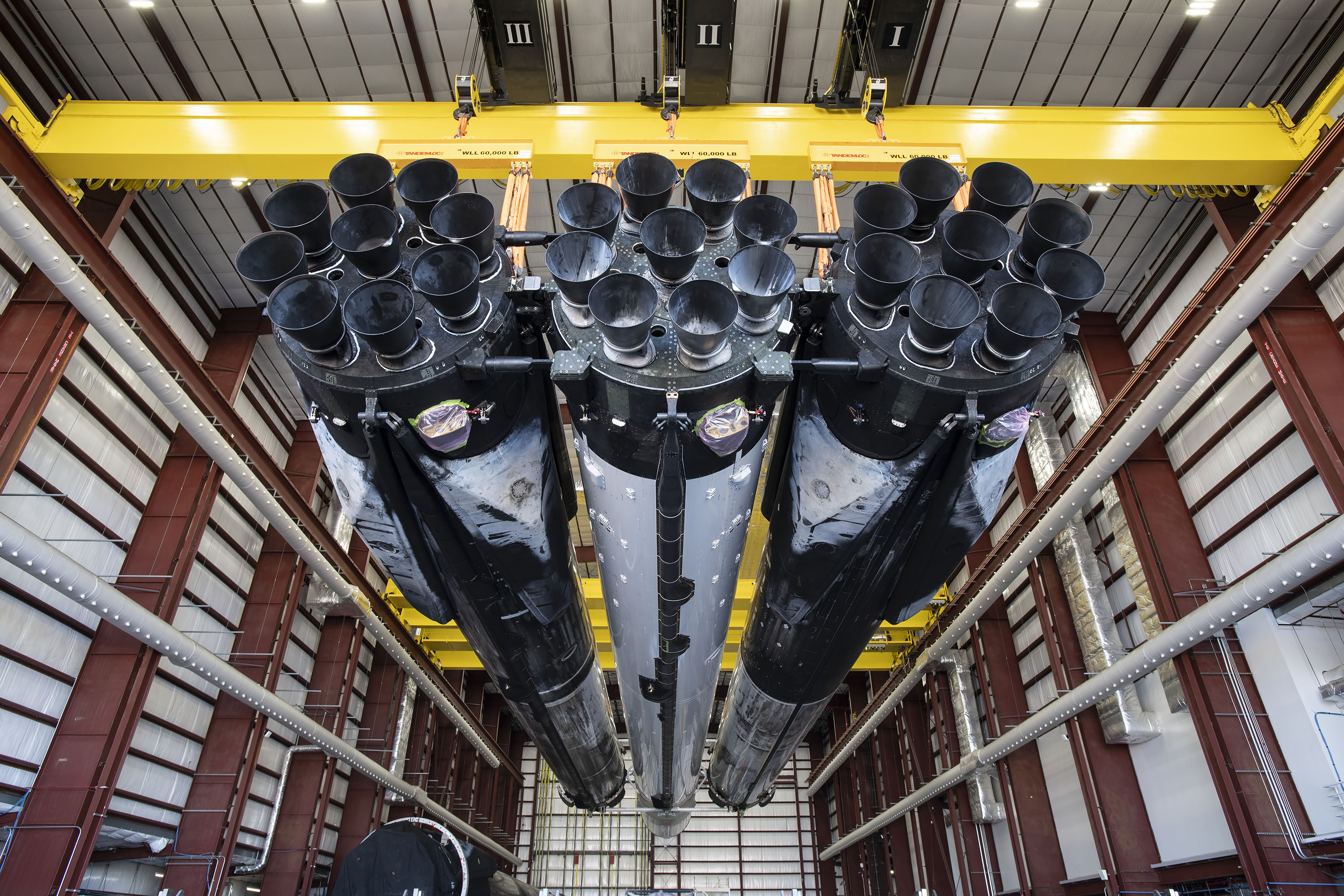 Another view of the fifth Falcon Heavy rocket in a hangar at NASA's Kennedy Space Center ahead of a scheduled launch in January 2023. SpaceX posted this photo on Jan. 7.