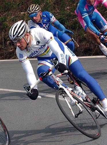 Tom Boonen corners confidently, resplendent in white