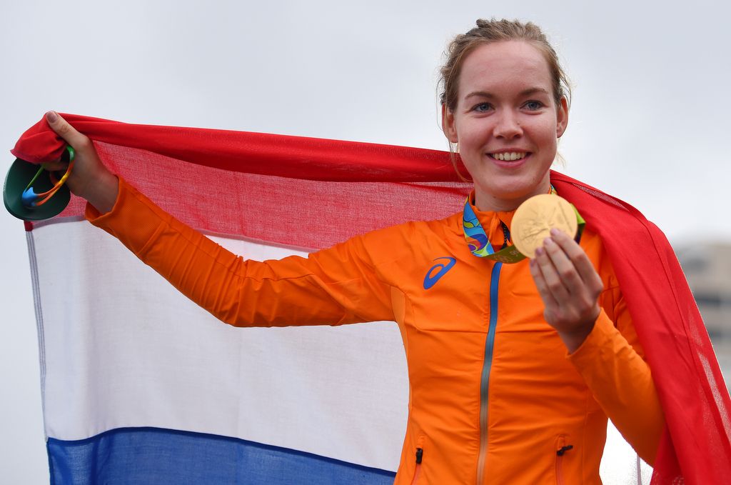Anna van der Breggen (Netherlands) shows off her gold medal