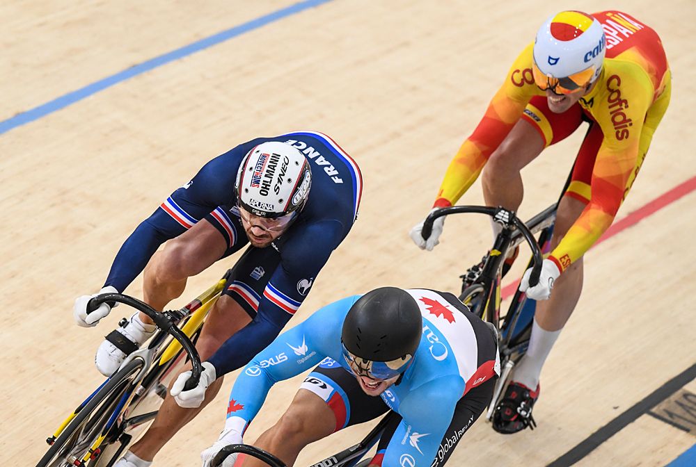 Cyclists compete in the men's Keirin first round during the Tissot UCI Track Cycling World Cup