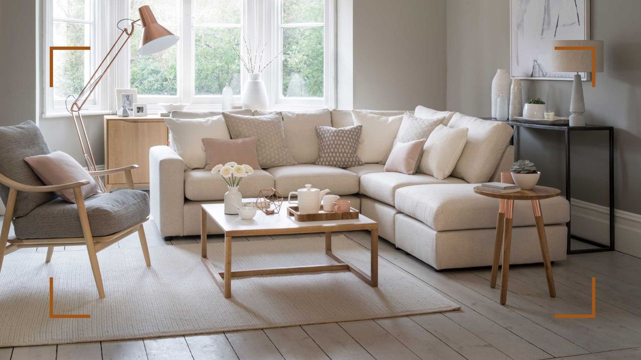 Neutral living room with generous beige corner sofa showing how to avoid common mistakes when buying a sofa by choosing a design that doesn&#039;t suit your space