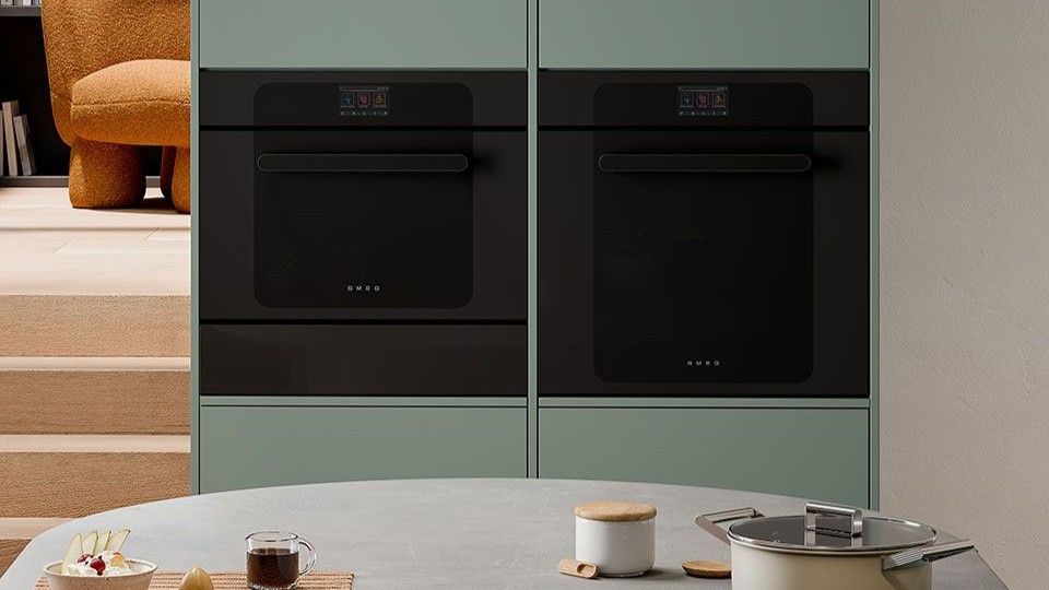 Smeg Musa ovens installed in neutral-colored kitchen