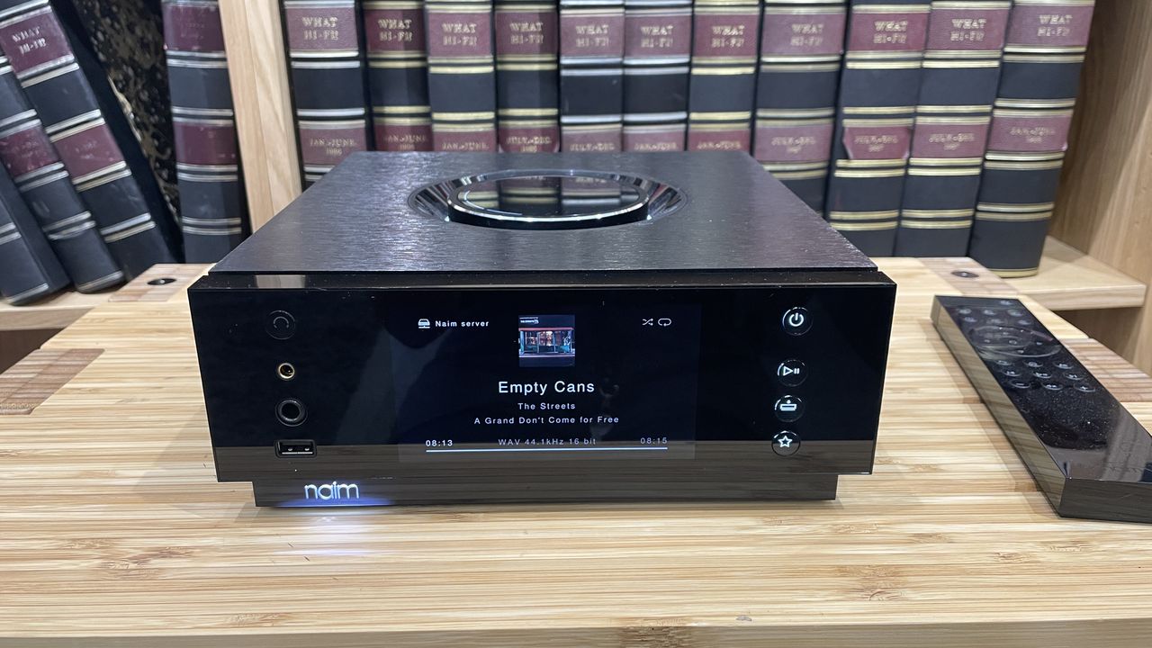 Naim Uniti Atom Headphone Edition on wooden rack