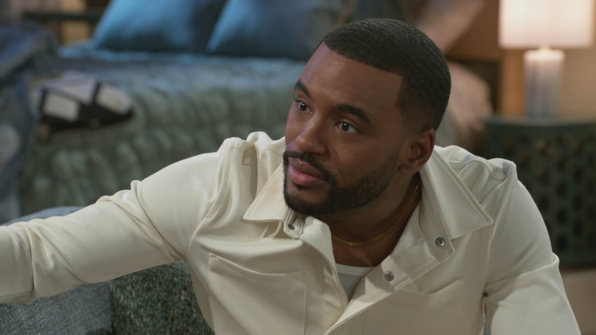 Sean Freeman as Andre talking to someone in Beyond the Gates
