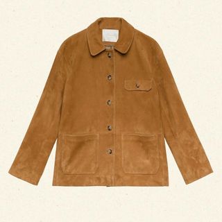 A suede jacket by Dôen shot against a cream background