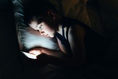 Child browsing internet on smartphone