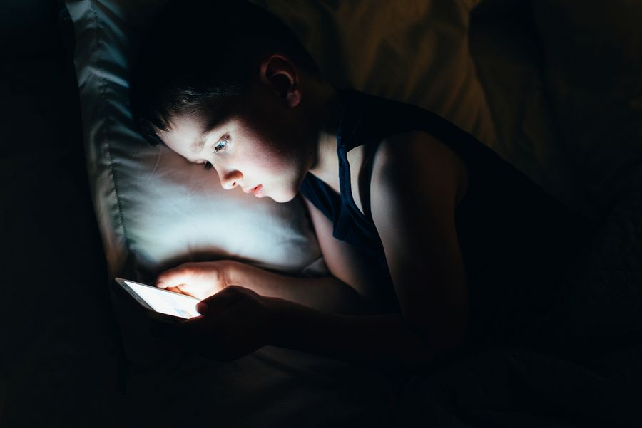 Child browsing internet on smartphone