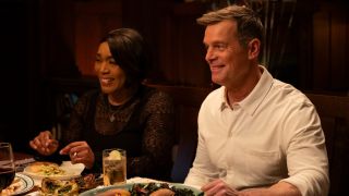 Athena and Bobby smiling at dinner on 9-1-1.