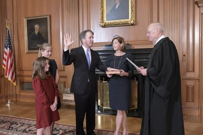 Justice Anthony M. Kennedy (retired) administers the Judicial Oath to Judge Brett M. Kavanaugh 