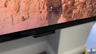 Samsung QE75QN900D 8K TV bottom of TV showing Samsung logo