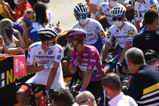AGRIGENTO ITALY OCTOBER 04 Start Mikkel Bjerg of Denmark and UAE Team Emirates White Best Young Rider Joao Almeida of Portugal and Team Deceuninck QuickStep Purple Points Jersey Santuario Maria SS DellAlto Alcamo Village Fans Public during the 103rd Giro dItalia 2020 Stage 2 a 149km stage from Alcamo to Agrigento 243m girodiitalia Giro on October 04 2020 in Agrigento Italy Photo by Tim de WaeleGetty Images