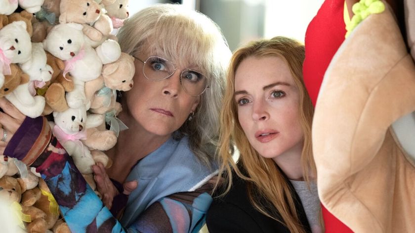 Jamie Lee Curtis and Lindsay Lohan peering through a pile of stuffed animals in Freakier Friday