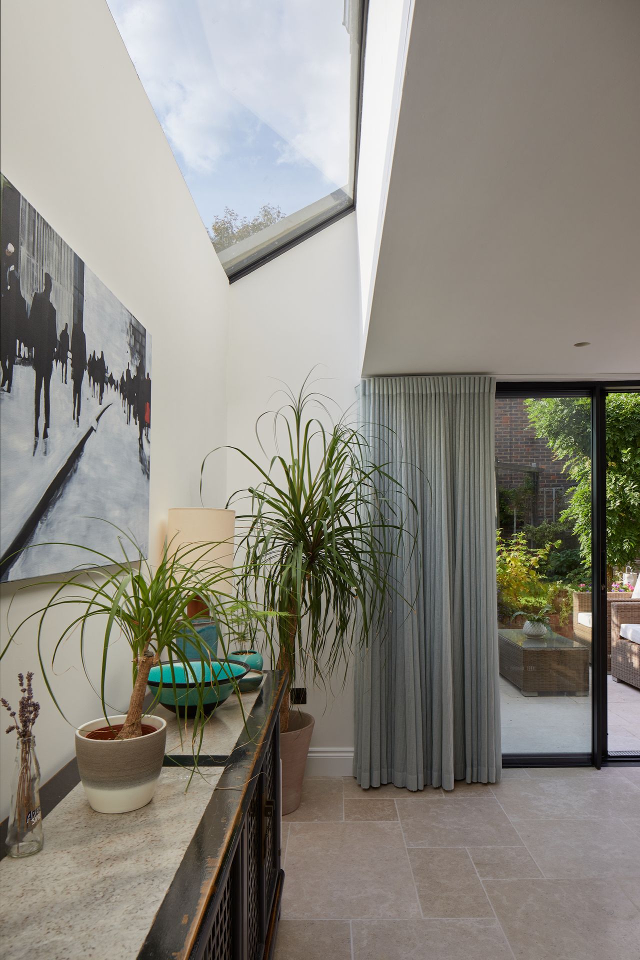 narrow rooflight above sideboard in dining area