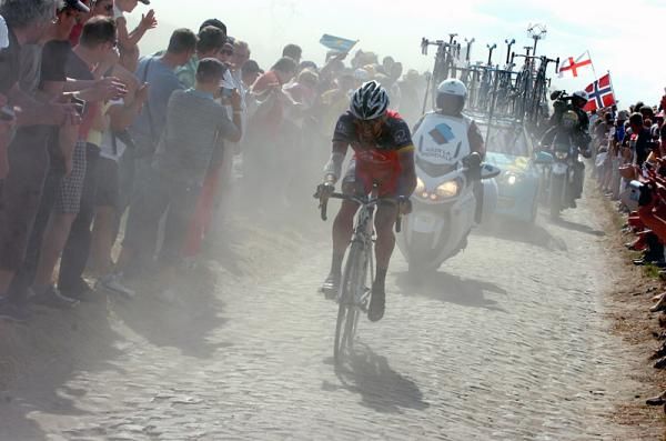 Lance Armstrong (RadioShack) rides alone on the cobbles after a mechanical.