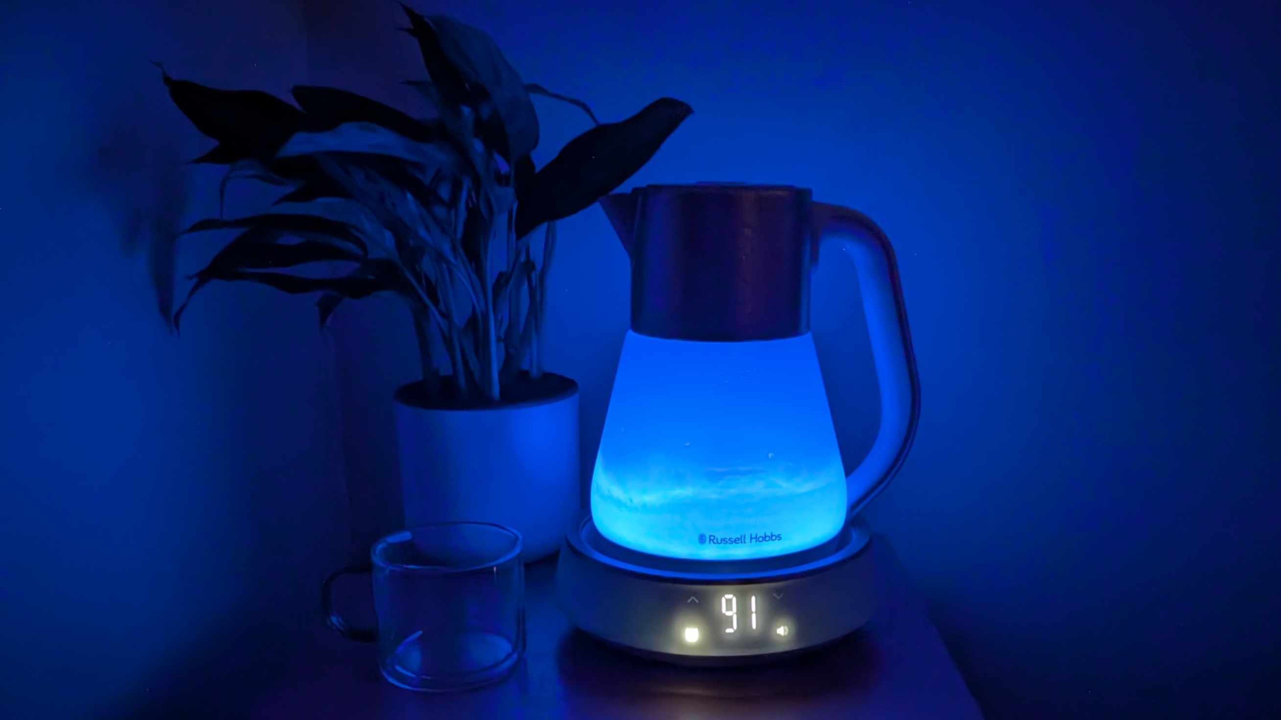 Russell Hobbs Calm Kettle boiling water while illuminated blue