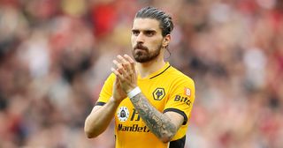 Manchester United target Ruben Neves of Wolverhampton Wanderers shows appreciation to the fans following defeat in the Premier League match between Liverpool and Wolverhampton Wanderers at Anfield on May 22, 2022 in Liverpool, England.
