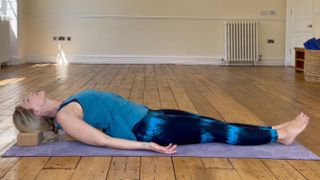 Michelle Maslin-Taylor, yoga teacher, doing supported fish pose