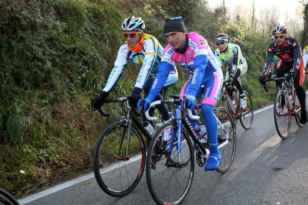 Alberto Contador rides with Paolo Tiralongo, with Oscar Pereiro just behind the two