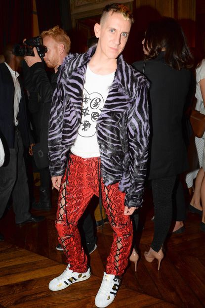 Jeremy Scott poses for the paps at Fashion Week