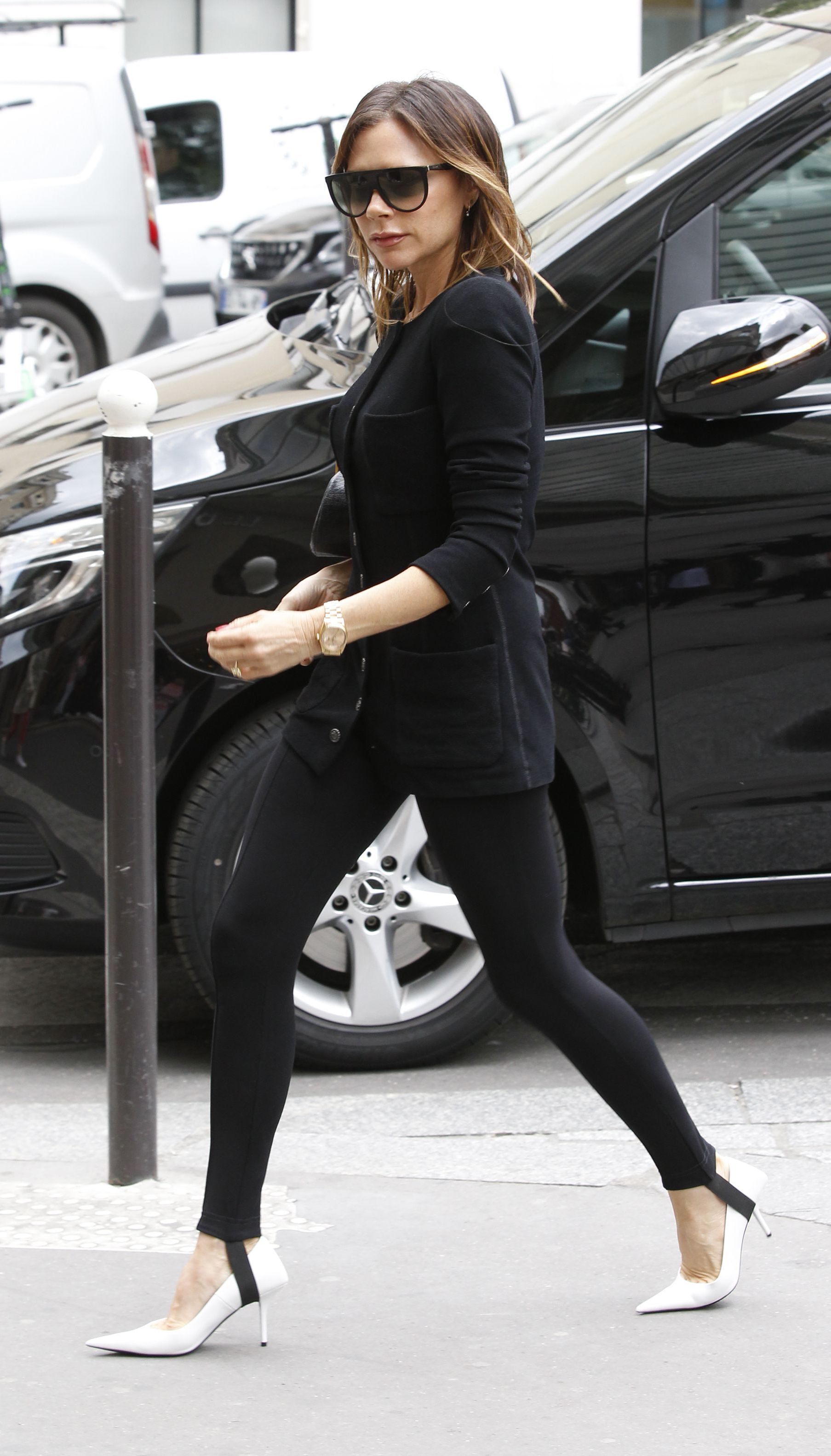 Victoria Beckham wearing stirrup leggings.