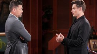 Joshua Morrow and Mark Grossman as Nick and Adam talking in an office in The Young and the Restless