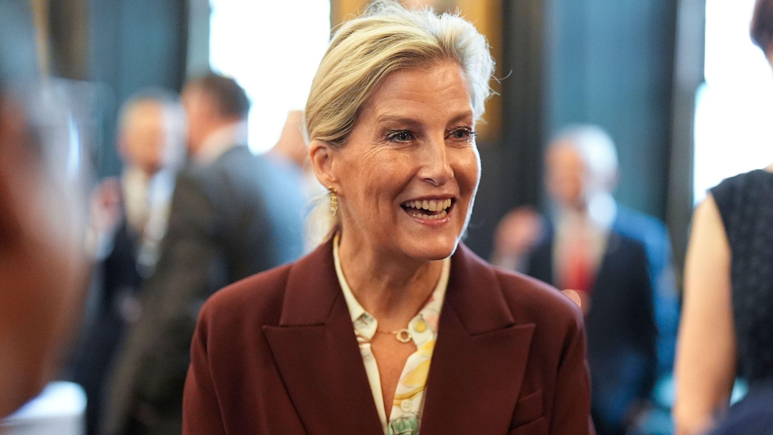 Duchess Sophie in cherry trouser suit