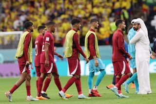 Qatar players leave the pitch after their 2-0 loss to Ecuador in the opening match of the 2022 World Cup.