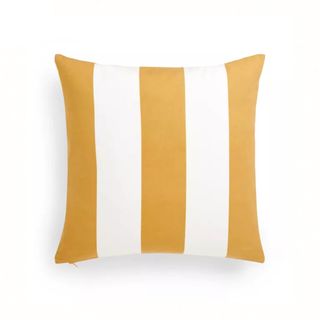 A yellow and white striped outdoor cushion