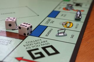 A close-up of the board game Monopoly