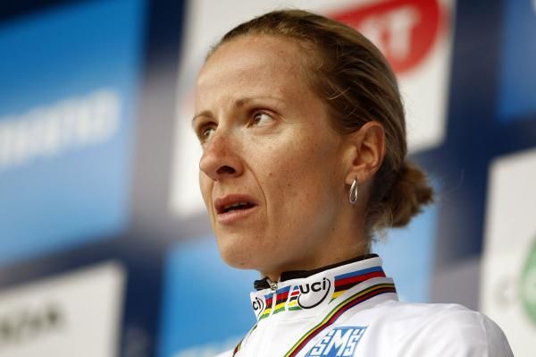 An emotional Judith Arndt on the podium