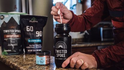 Picture of a cyclist using CBD drink mix
