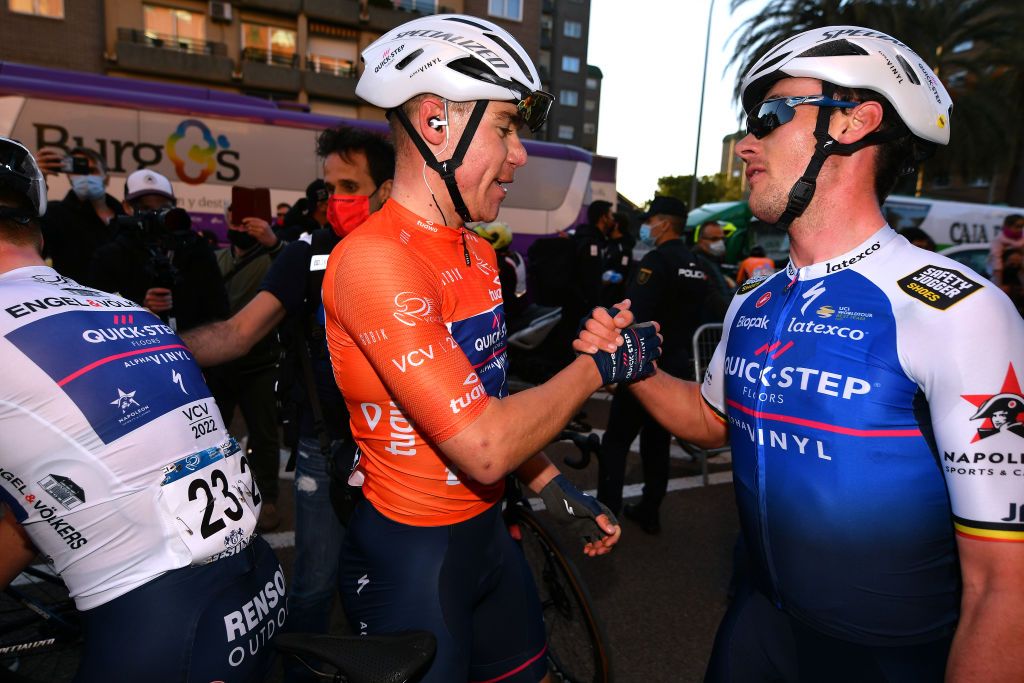 VALENCIA SPAIN FEBRUARY 06 LR Fabio Jakobsen of Netherlands Orange Points Jersey nand Yves Lampaert of Belgium and Team QuickStep Alpha Vinyl celebrate winning during the 73rd Volta A La Comunitat Valenciana 2022 Stage 5 a 92km stage from Paterna to Valencia VCV2022 on February 06 2022 in Valencia Spain Photo by Dario BelingheriGetty Images