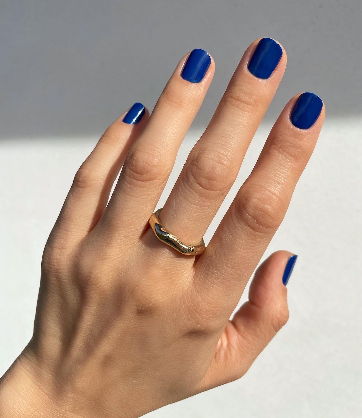 Blue ink nails.
