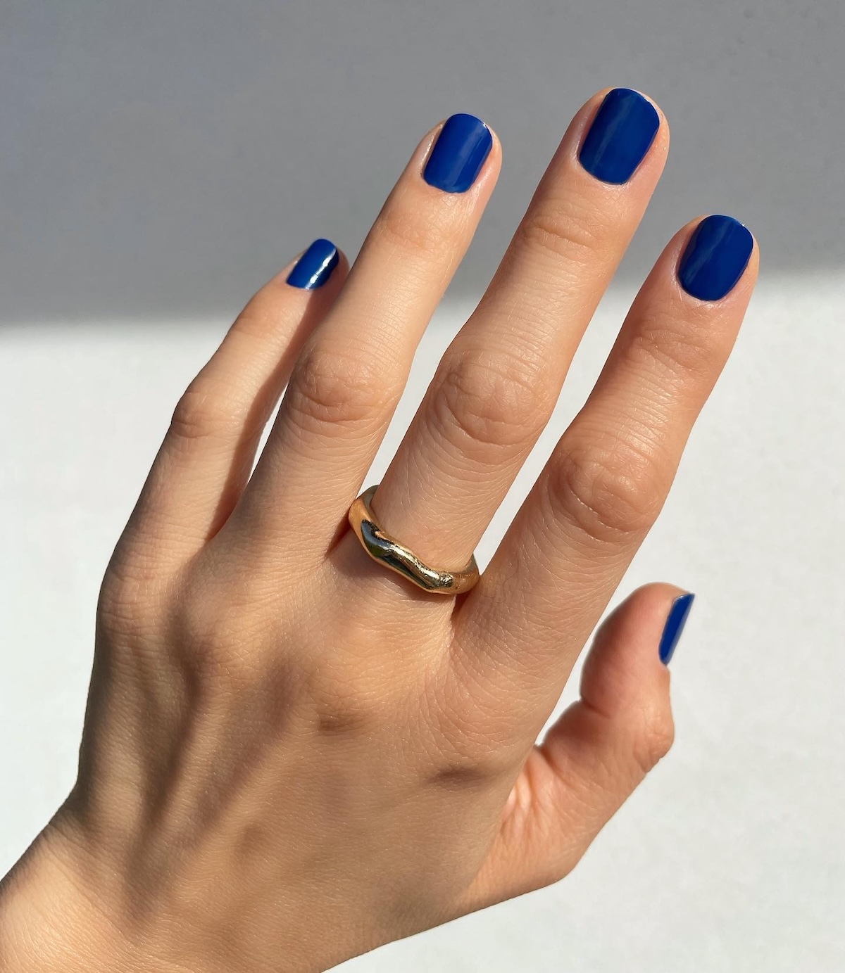 Blue ink nails.