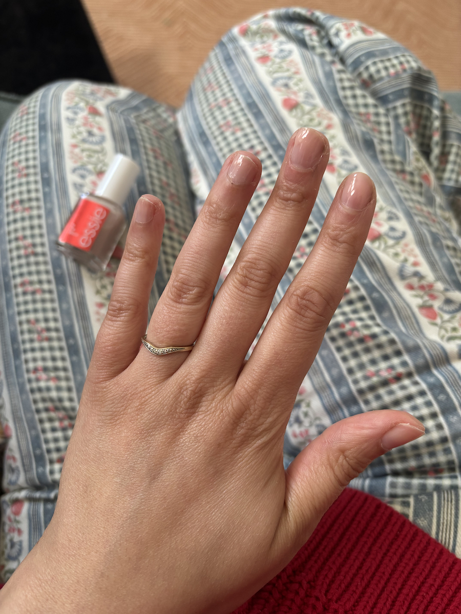 Mica Ricketts wearing Essie To The Rescue nail polish on hands