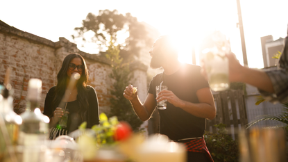 People drinking cocktails outside
