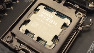 An AMD Ryzen 9 7950X slotted into an AM5 socket