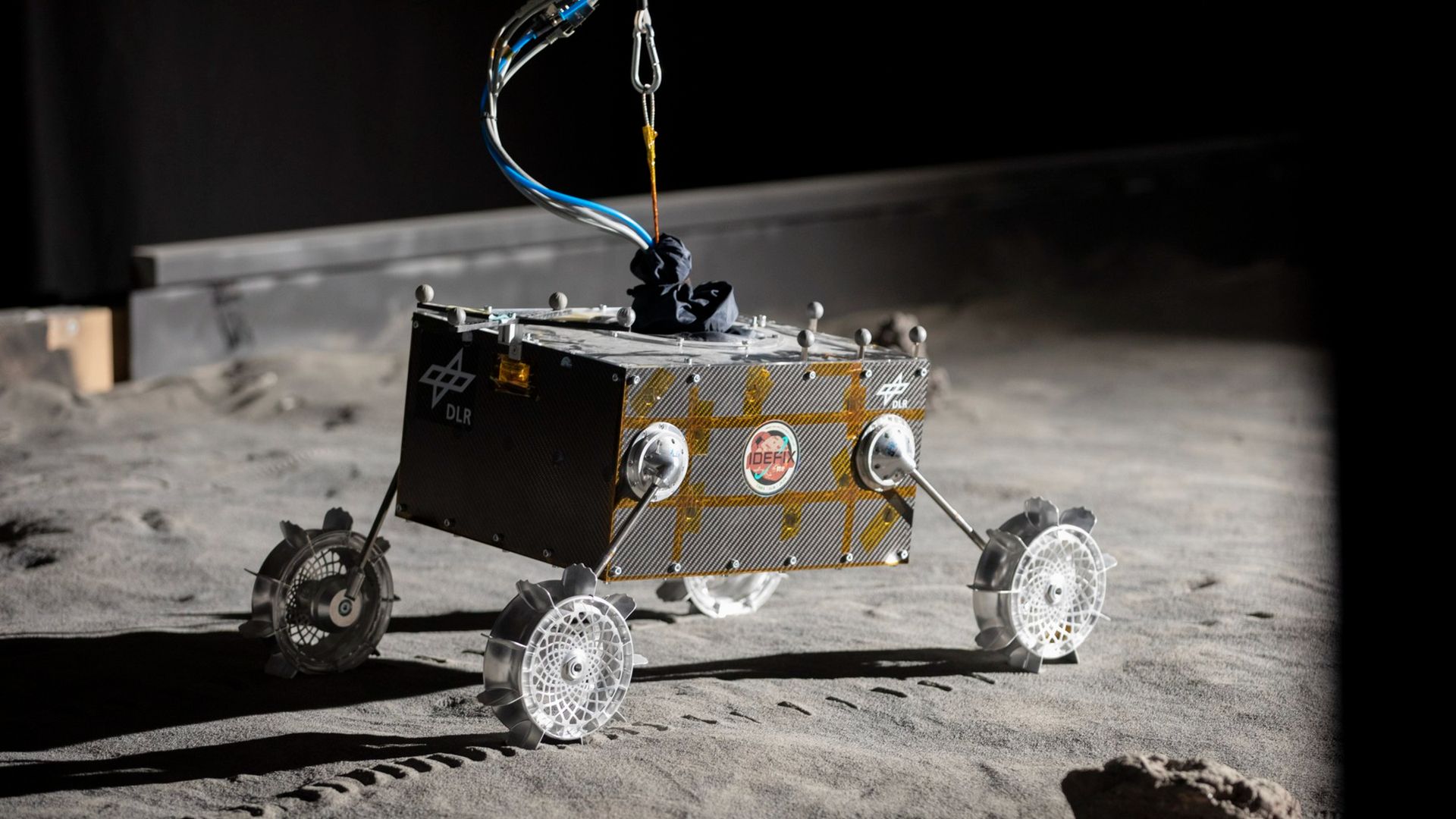 A photo of a replica of the IDEFIX rover being tested in a lab