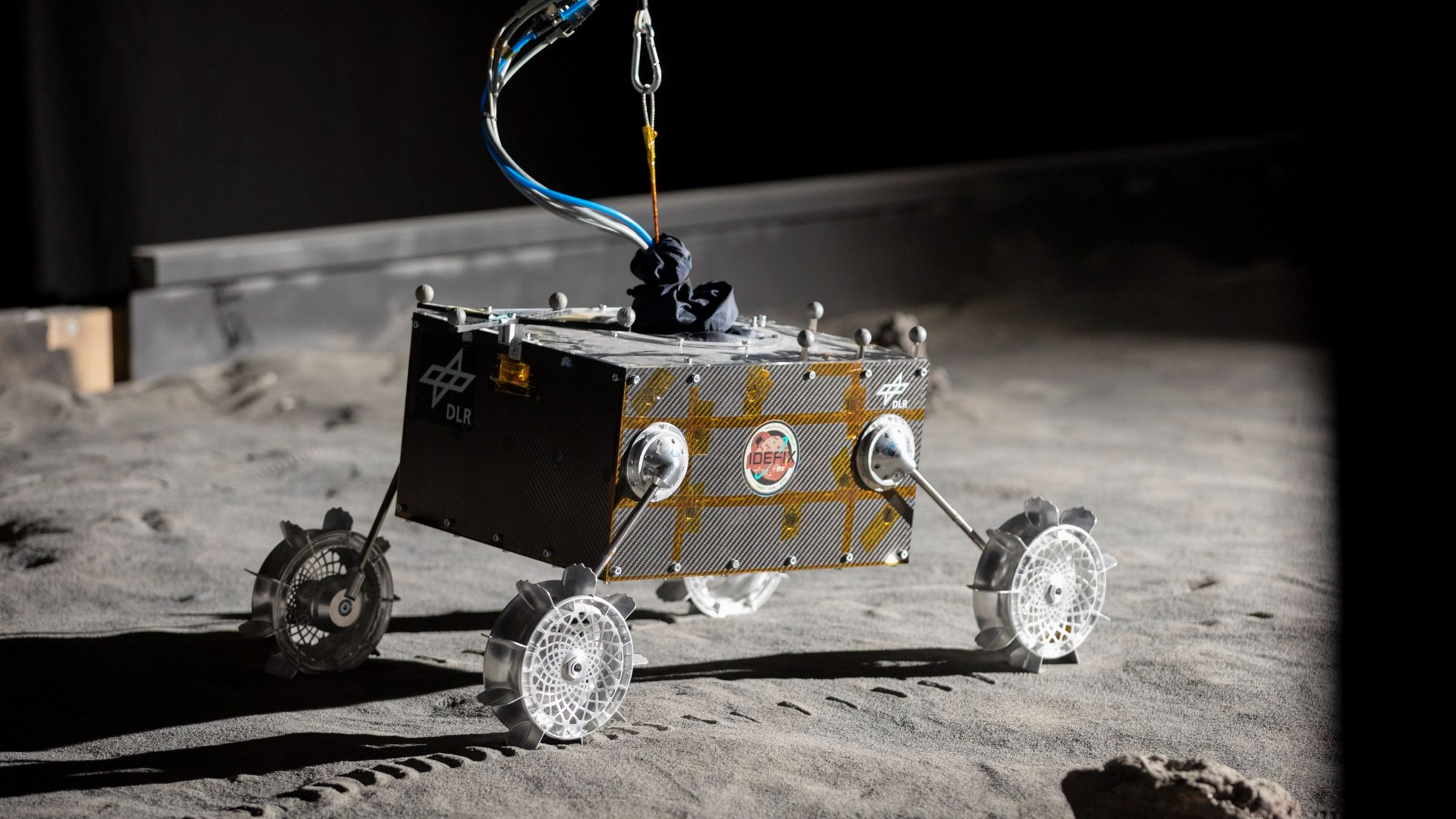 A photo of a replica of the IDEFIX rover being tested in a lab