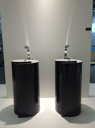 Nendo wrapped up black and white standalone sinks in their new design for Ceramica Flaminia