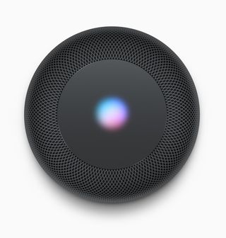 The top of the HomePod lights up to show Siri is listening.