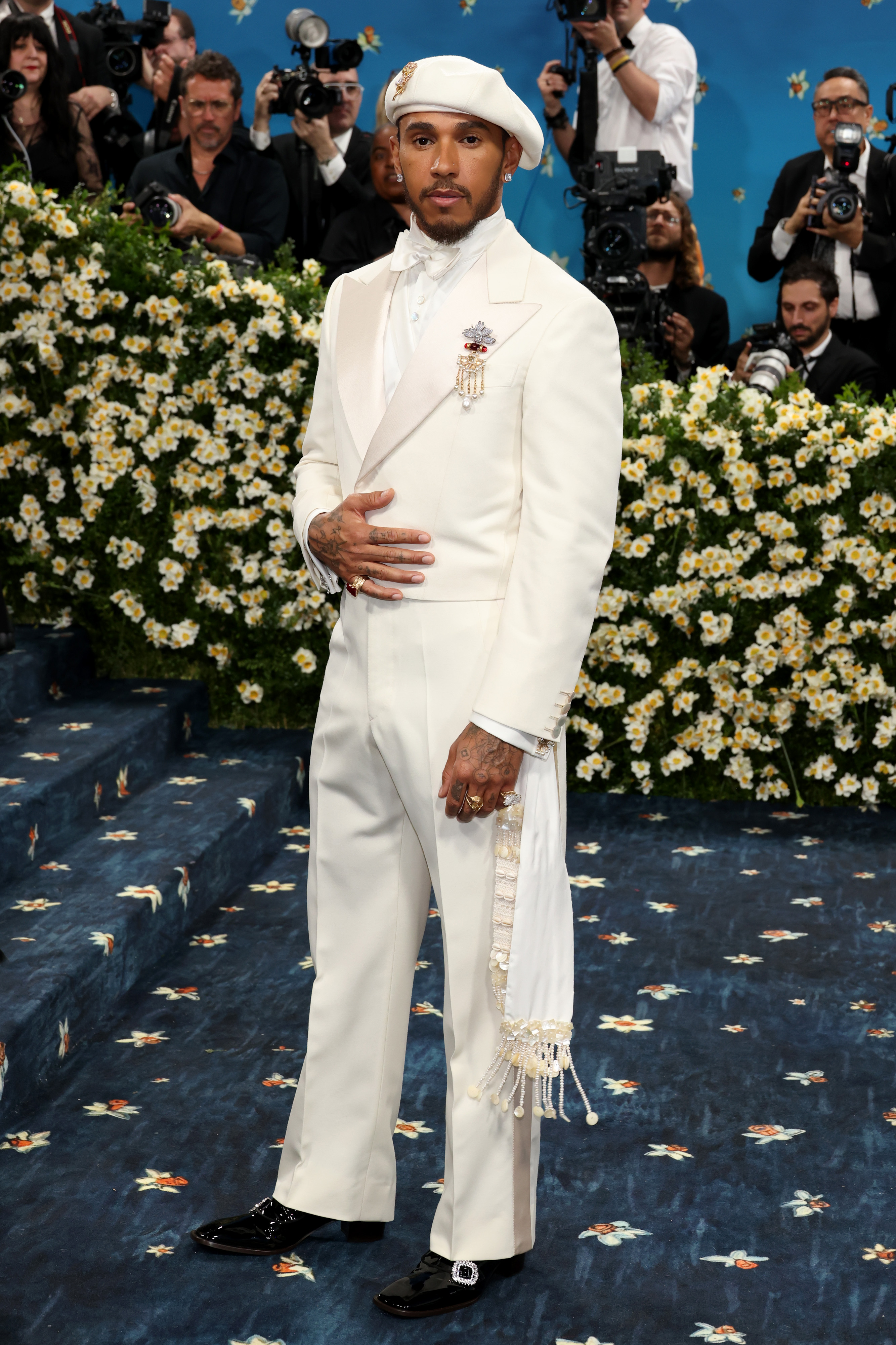 Lewis Hamilton, Met Gala Co-Chair, jewelry detail, attends the 2025 Met Gala Celebrating "Superfine: Tailoring Black Style" at Metropolitan Museum of Art on May 05, 2025 in New York City. (