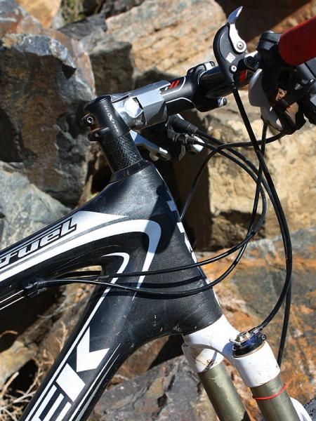 Trek opts for a non-tapered head tube on the Top Fuel to minimize weight.