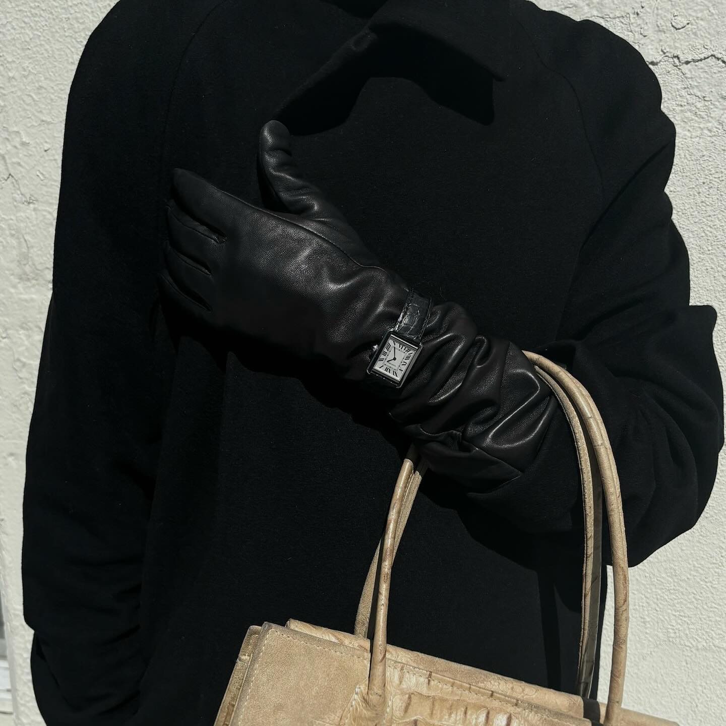 An image of @andrea____ricci wearing the mock croc trend, one of the biggest animal print trends of 2026.