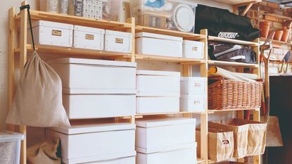 Paint tins in disorganised storage
