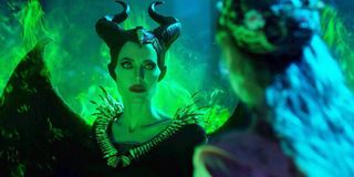 Maleficent: Mistress of Evil Maleficent glows green, and faces Aurora