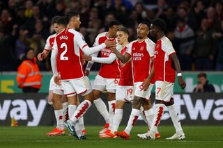 Leandro Trossard celebrates with his Arsenal team-mates after scoring against Wolves in April 2024.