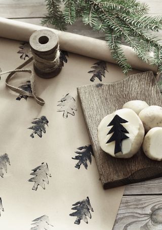 DIY Christmas wrapping paper with homemade stamp and ink